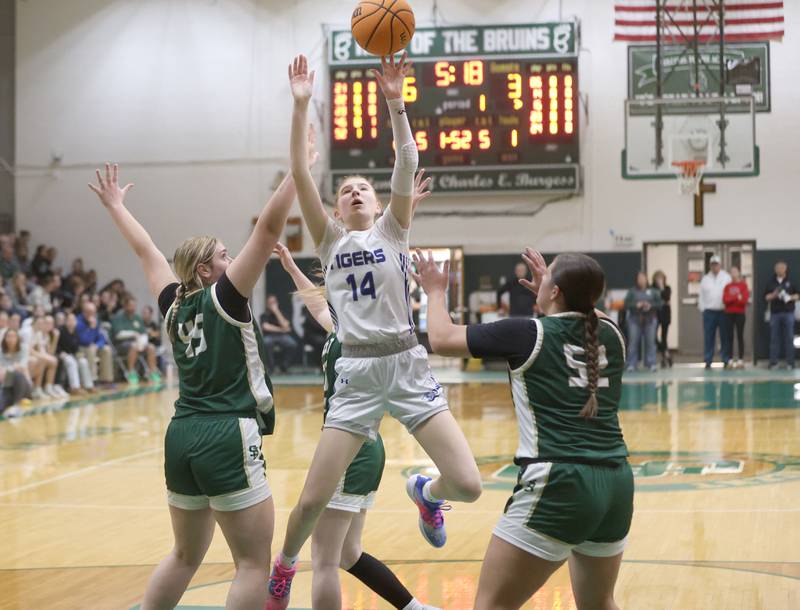 Princeton's Payton Brandt lets go of a shot in the lane over St. Bede's Savannah Bray and Ava Balestri during the Class 2A Regional semifinal game on Tuesday, Feb. 17, 2026 at St. Bede Academy.