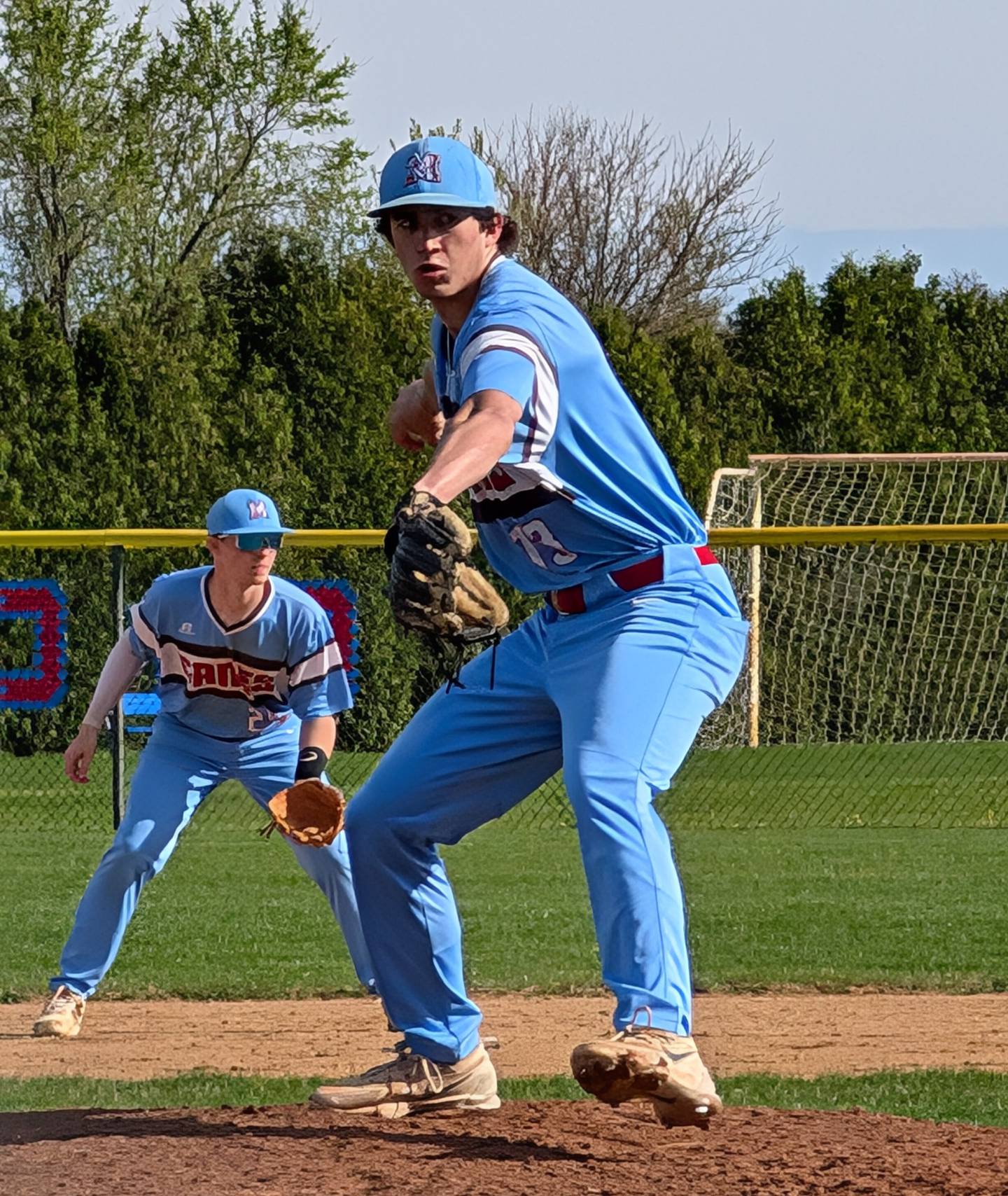 Marian Central's Adam Wrzos delivers a pitch against Wheaton Academy on Tuesday, April 29, 2025, in Woodstock.