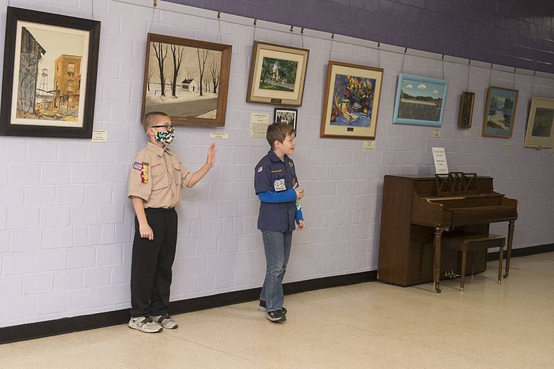 Roberts (left) and Shroyer greet and thank donors as they come and go from the Loveland House Tuesday, April 19, 2022.