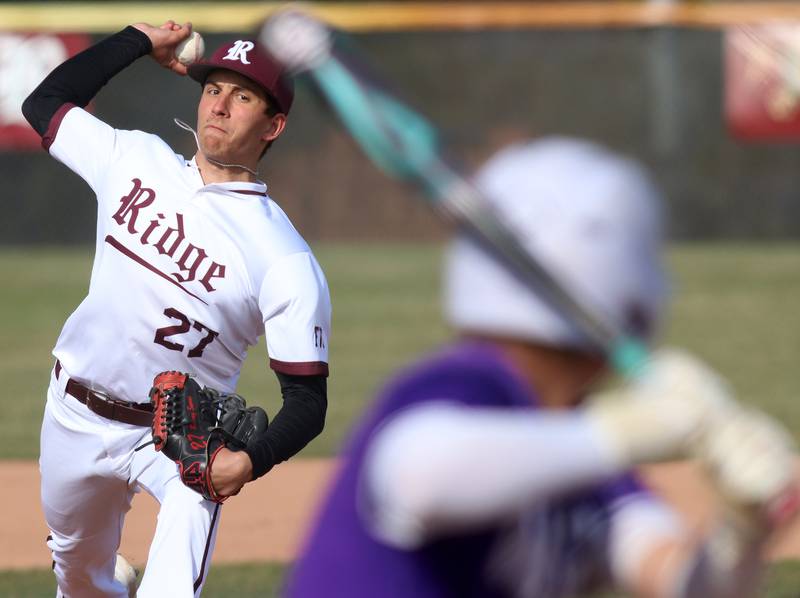 Prairie Ridge’s Danny Savas delivers against Hampshire in varsity baseball on Wednesday, April 16, 2025, at Prairie Ridge High School in Crystal Lake.