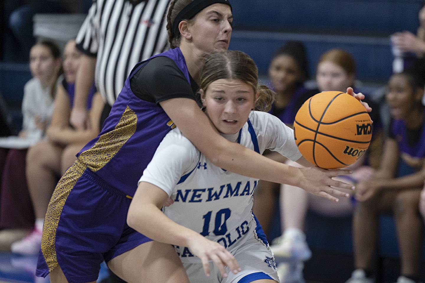 Newman’s Elaina Allen is fouled by Mendota’s Brooklyn Baxa Thursday, Dec. 4, 2025.
