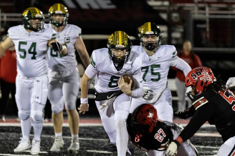 Fremd's Johnny O'Brien finds an opening during an 8A varsity football playoff game against Bolingbrook at Bolingbrook on Nov. 15, 2025.