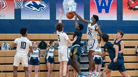 Boys Basketball: Mekhi Lowery, Oswego East block party send Wolves past Neuqua into sectional final