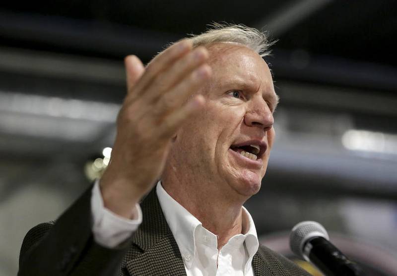 Gov. Bruce Rauner addresses reporters, the public and elected officials during a news conference in July announcing the construction of a bridge connecting Houbolt Road and CenterPoint intermodal in Joliet. Rauner suggested at the time that construction may not start this year, although the Joliet City Council is set consider hiring a project manager for work on the interchange Tuesday.