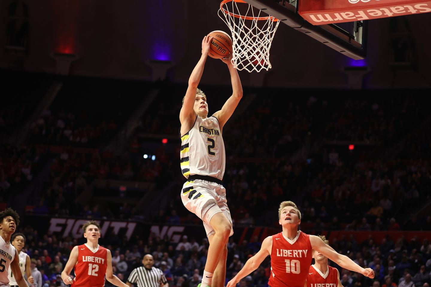 Yorkville Christian’s Jaden Schutt goes in for the dunk against Liberty in the Class 1A championship game at State Farm Center in Champaign. Friday, Mar. 11, 2022, in Champaign.