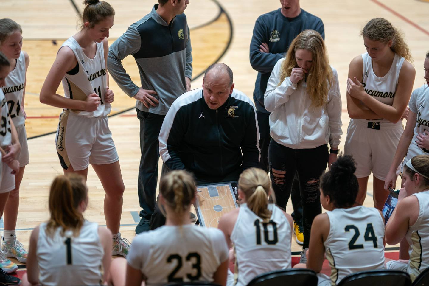 Sycamore's head coach Adam Wickness talks to his players during the Batavia MLK Showdown at Batavia High School on Monday, Jan 16, 2023.