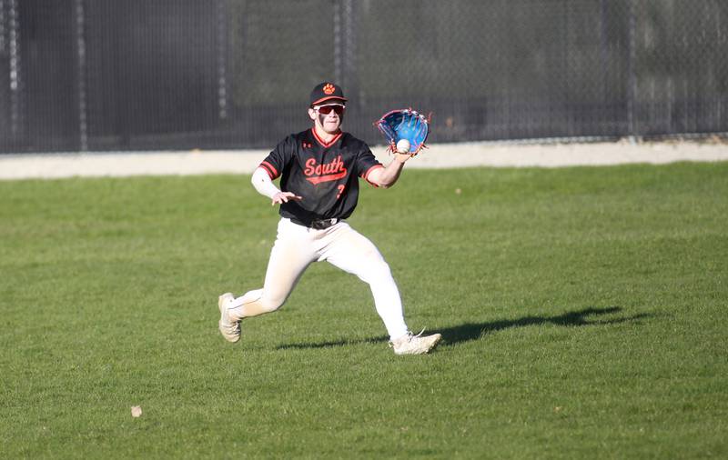 Wheaton Warrenville South's Nico Olszewski makes a catch in center field during a game against Geneva on Monday April 14, 2025 in Wheaton.