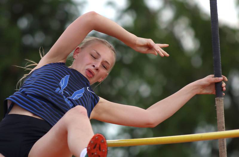 Woodstock’s Clementine Arana clears the bar in the pole vault in IHSA Class 2A Girls Sectional Track action at Genoa-Kingston School in Genoa on Friday, May 16, 2025.