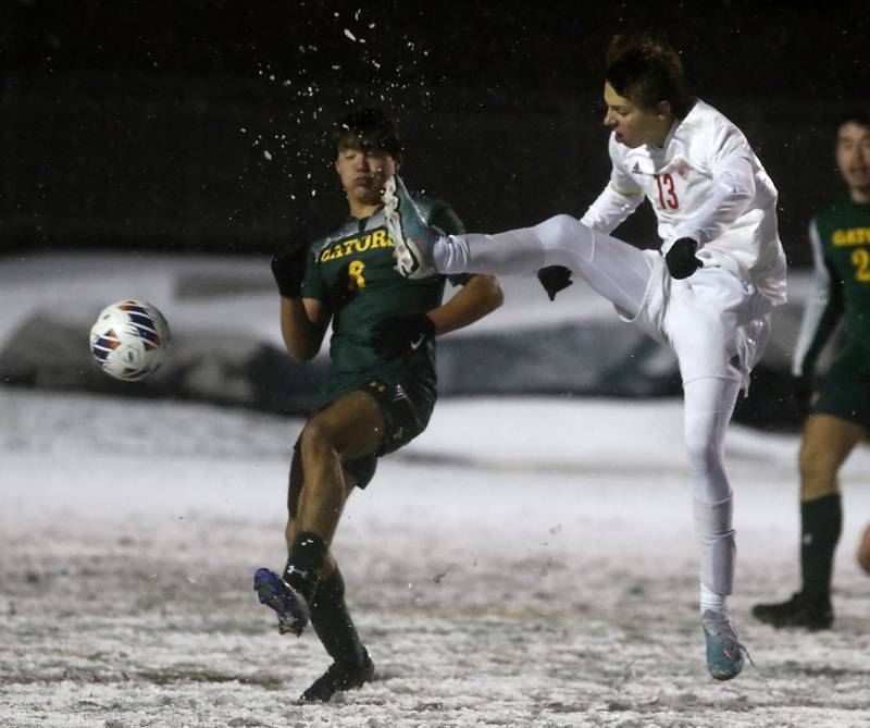 Timothy Christian's Caleb Bode kicks the ball away from Crystal Lake South's Hayden Stone during the IHSA Class 2A Grayslake Central Supersectional soccer match on Tuesday, Oct. 31, 2023, at Grayslake Central High School.