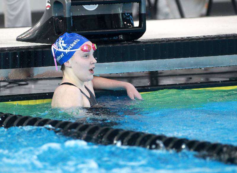 Burlington Central’s Kate Farrell looks at her time following the 500-yard freestyle consolation heat during the IHSA Girls State Swimming and Diving Championships at the FMC Natatorium in Westmont on Saturday, Nov. 11, 2023.