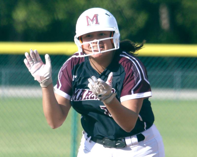 Marengo’s Arianna Rodriguez gets revved rounding the bases on a home run against Aurora Central Catholic in IHSA Class 2A Regional Title Game action softball at Marengo High School in Marengo on Friday, May 23, 2025.