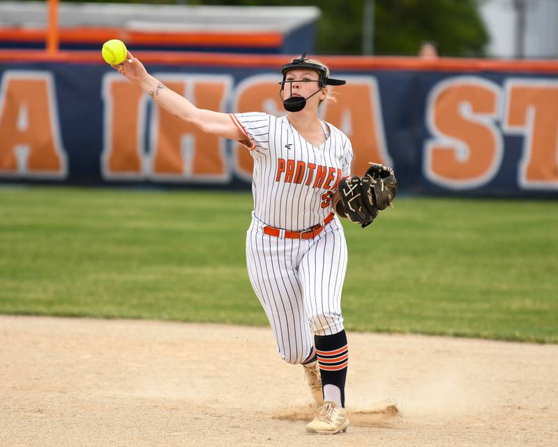Oswego's Kennedy Gengler (9) throws the ball to first base in time for an out during the regional final game on Friday May 22, 2026, while takin on Benet Academy at Oswego High School.