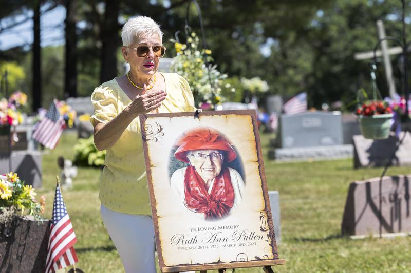 Kathy Freeman, Ruth Ann Pullen’s daughter, shares memories with the family as they lay mom to rest Friday, July 7, 2023.