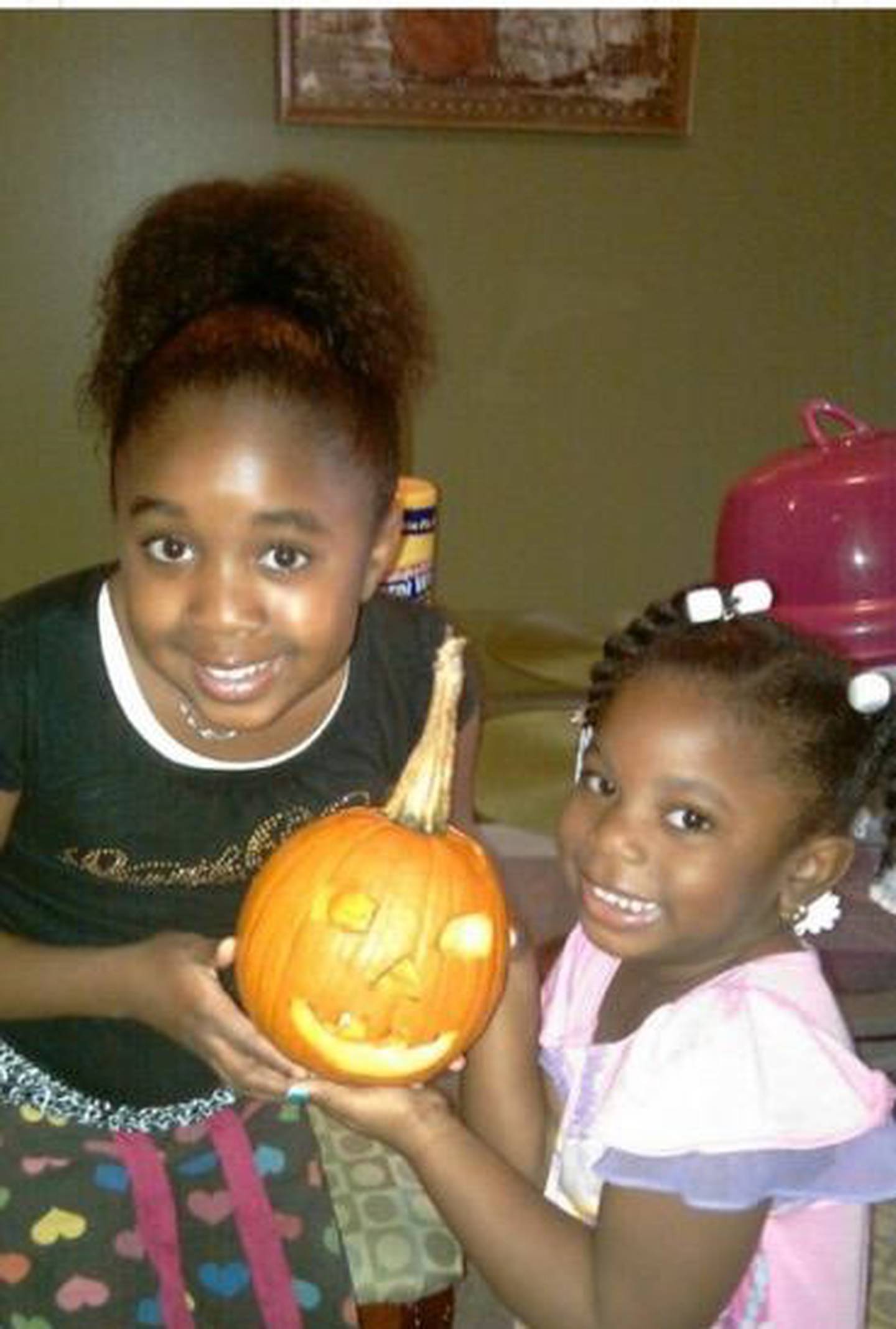 Dykota Morgan, 15, of Bolingbrook was an athlete, artist, activist and scholar. She died of complications from COVID-19 on May 4. She is pictured in her younger years with her older sister Dyman.