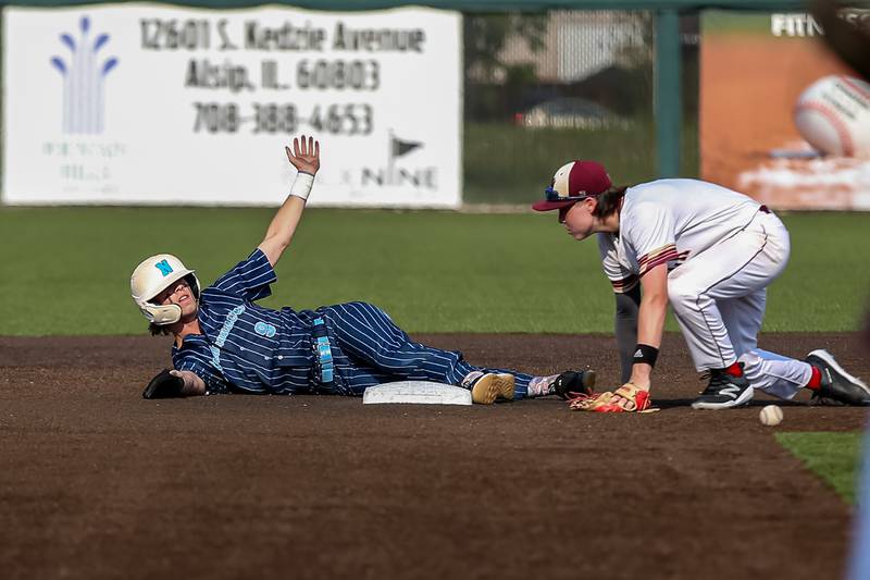 Nazareth's Nick Drtina (9) slides safely into second base during the Class 3A Crestwood Supersectional game between St. Ignatius at Nazareth.  June 6, 2022.