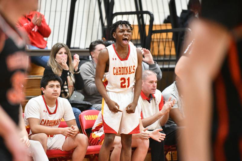 St. Anne's Jaqorri Wyatt celebrates a scoring play Friday, Feb. 14, 2025, during the Cardinals' 70-38 victory over Beecher in the River Valley Conference championship.