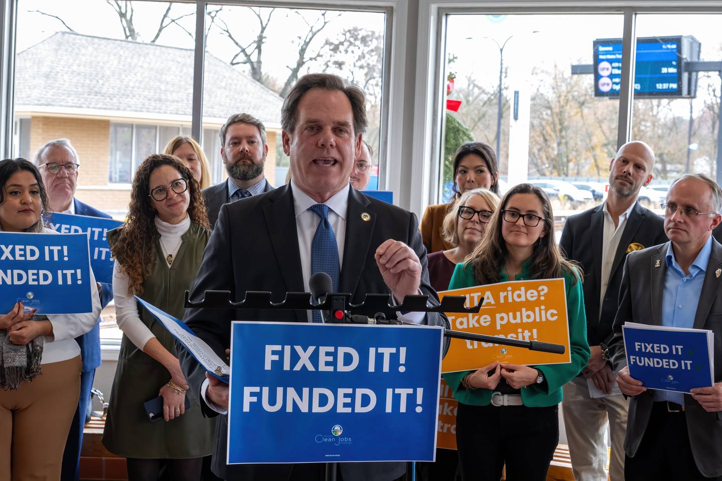 Geneva Mayor Kevin Burns praises the newly passed Northern Illinois Transit Authority Act – known as NITA – at a news conference Nov. 25, 2025 at the city's Metra station.