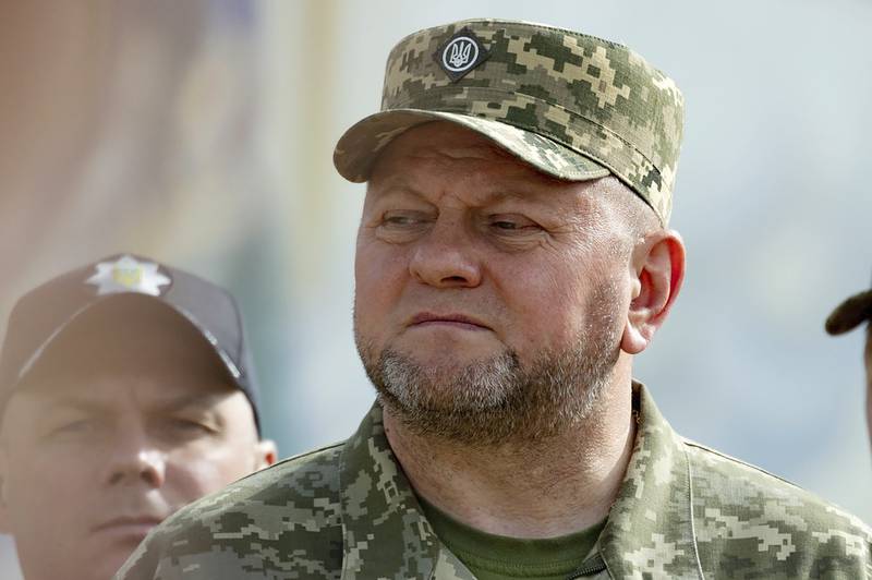FILE - In this photo provided by the Ukrainian Presidential Press Office, Commander-in-Chief of Ukraine's Armed Forces Valerii Zaluzhnyi, front, attends an event for marking Statehood Day in Mykhailivska Square in Kyiv, Friday, July 28, 2023. Ukrainian President Volodymyr Zelenskyy said Thursday, Feb. 8, 2024 he met with Zaluzhnyi and told him it's time for someone new to lead the army.