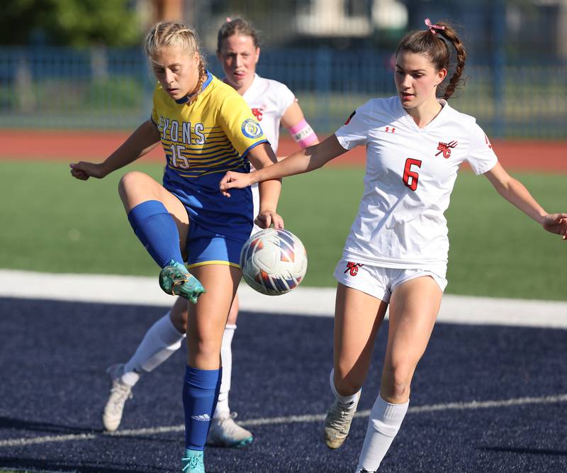 Lyons Township's Zibby Michaelson (15) handles the ball against Hinsdale Central's Grace Lanspeary (6) during the IHSA Class 3A girls soccer sectional final match between Lyons Township and Hinsdale Central at Reavis High School in Burbank on Friday, May 26, 2023.