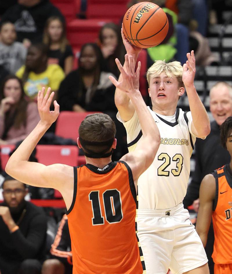 Sycamore's Carter York shoots over DeKalb's Eric Rosenow during the First National Challenge Friday, Jan. 27, 2023, at The Convocation Center on the campus of Northern Illinois University in DeKalb.