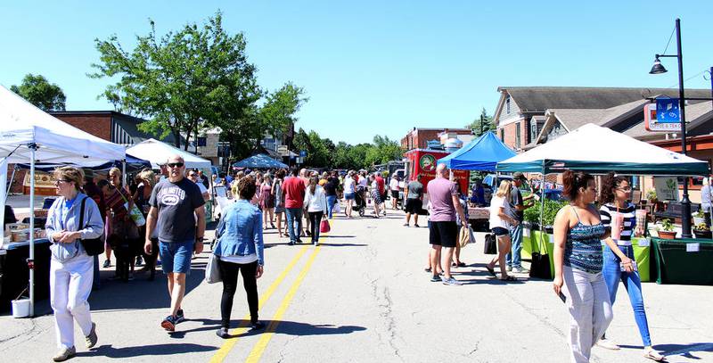 The Oswego Country Market saw more than 3,000 visitors on its opening in May 2018, with booths lining Main Street and the Village Grind parking lot in downtown Oswego.