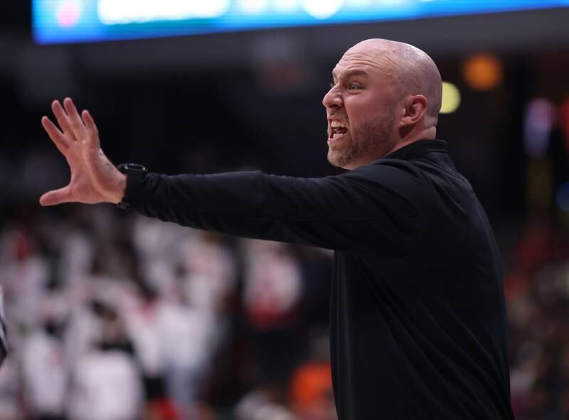 Downers Grove North coach James Thomas shouts out a play during the boys 4A super-sectional game between Kenwood Academy and Downers Grove North high school in Chicago on Monday, March 6, 2023.