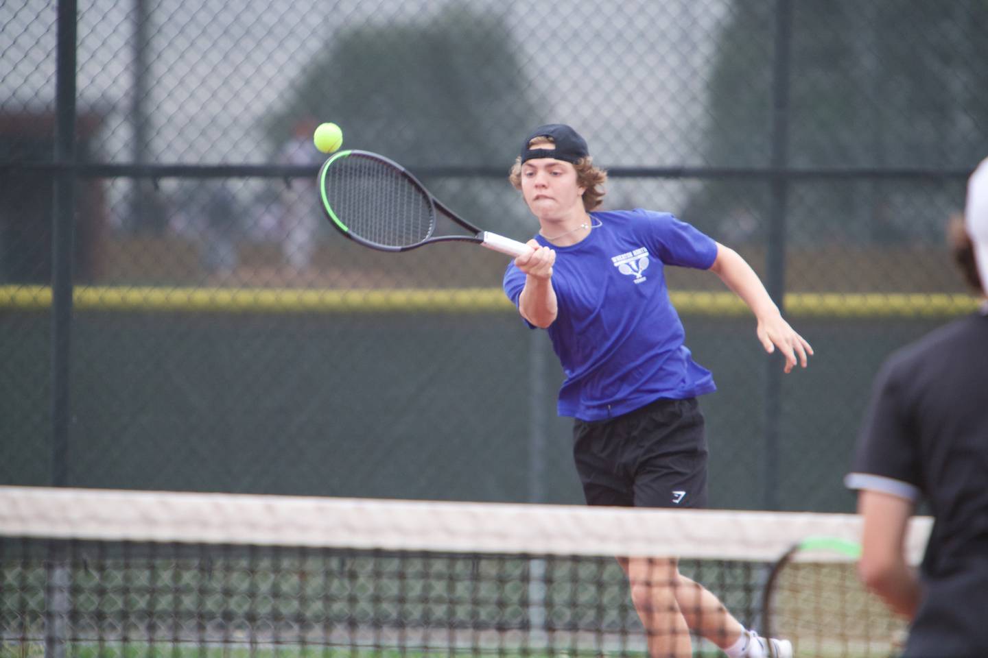 Wheaton North's Dylan Wallace competes during a doubles match at the DuKane Conference Meet on Saturday, May13,2023 in Batavia.