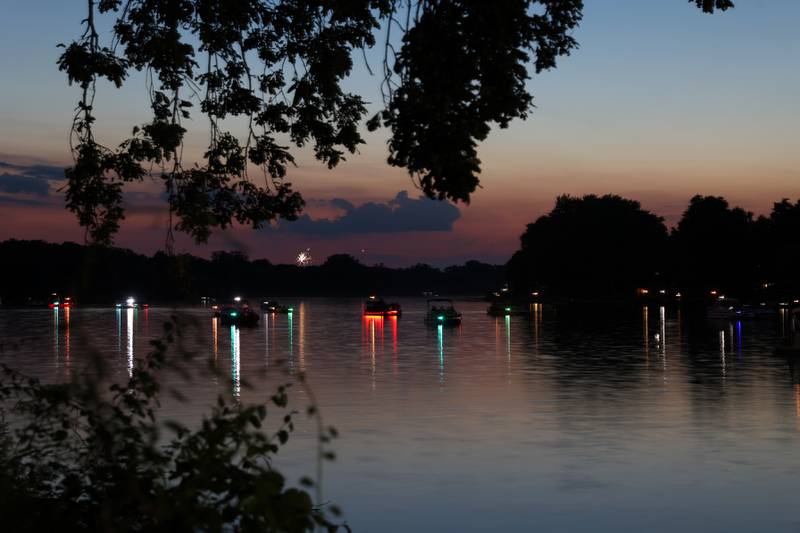Boaters anchor in the Kankakee River ahead of the city of Kankakee's fireworks show at Kankakee Community College on Friday, July 4, 2025.