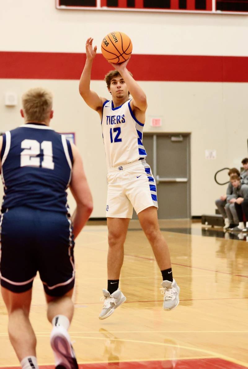 Princeton's Asa Gartin fires from the top against Fieldcrest Tuesday night at Hall High School.