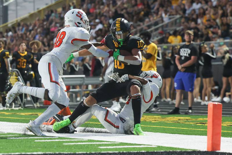 Joliet West’s Parker Schwarting is pulled out of bounds after a catch and run resulting in a first down against Shepard on Friday, Aug. 25, 2023 in Joliet.