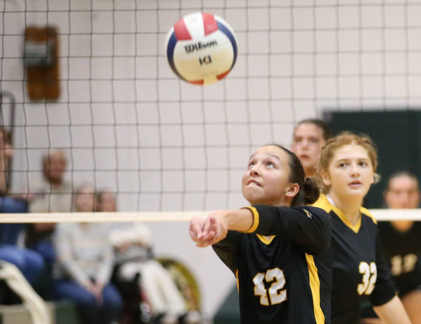 Putnam County's Eme Bouxsein bumps the ball to the front of the net for teammate Maggie Sprat on Tuesday, Sept. 24, 2024 at St. Bede Academy.