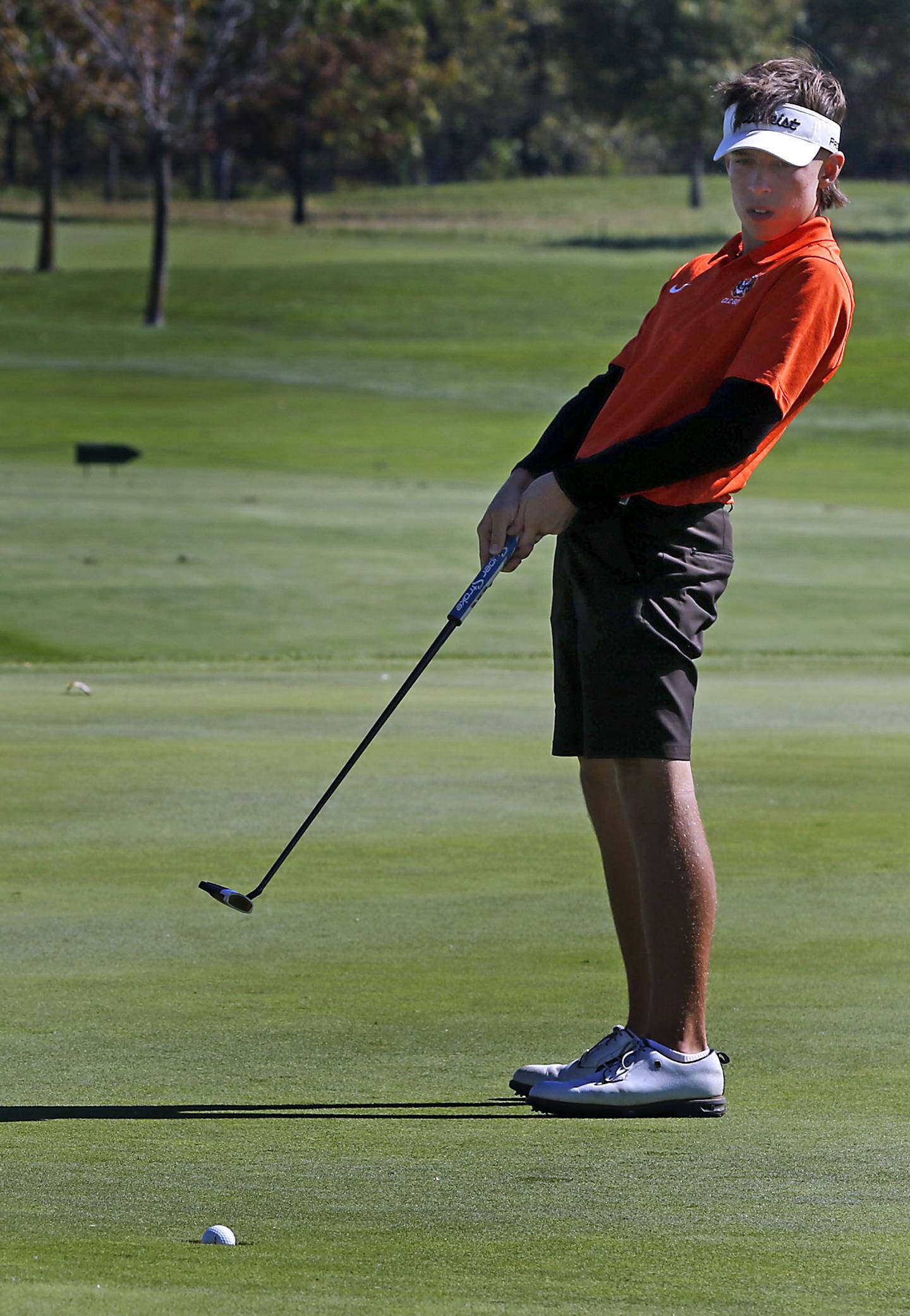 Crystal Lake Central’s Jack Bice uses some body “English” to sink a birdie putt on the eighth green during the IHSA Class 3A Dundee-Crown Regional golf tournament on Wednesday, Oct. 2, 2024 at Randall Oaks Golf Club in West Dundee.