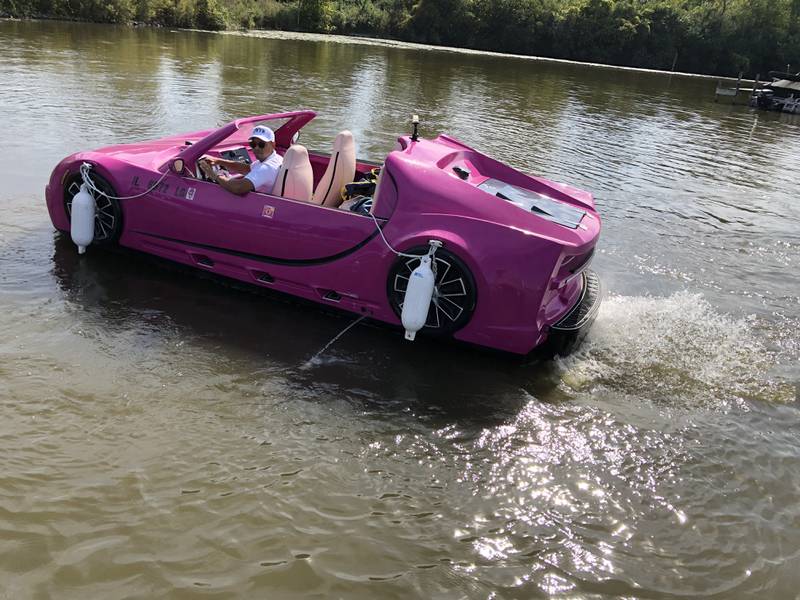 The Barbie World car is one of at least five water boat cars Chicago-based Luxury Jet Cars LLC put in at Port of Blarney on Thursday, Oct. 2, 2025. The company plans to lease the boats - made to look like luxury brand autos - into October and then next year on the Chain O' Lakes