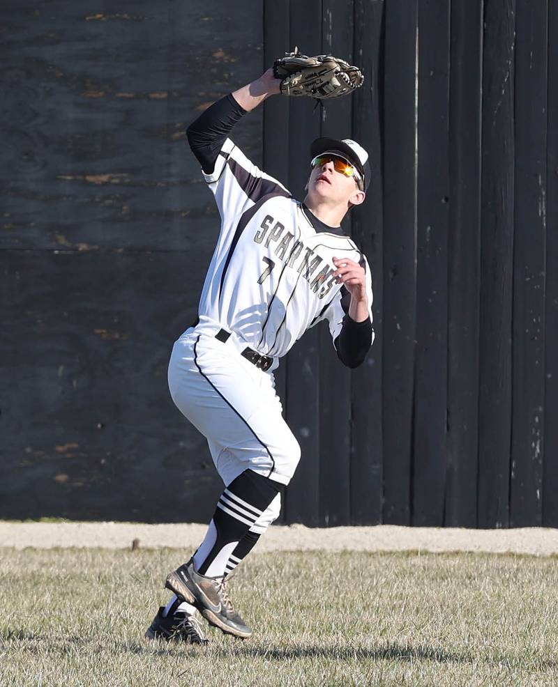 Sycamore's Kiefer Tarnoki hauls in a fly ball during their game against Harlem Monday, March 27, 2023, at the Sycamore Community Park.
