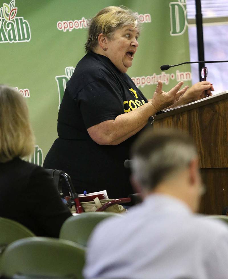 Former DeKalb Mayor Bessie Chronopoulos takes the podium to give her opinion during a special council meeting on Monday, Oct. 30, 2017 at the DeKalb Municipal Building in DeKalb.  City council members are discussing the acquisition of the abandoned low-income apartment building at 912 Edgebrook Drive.