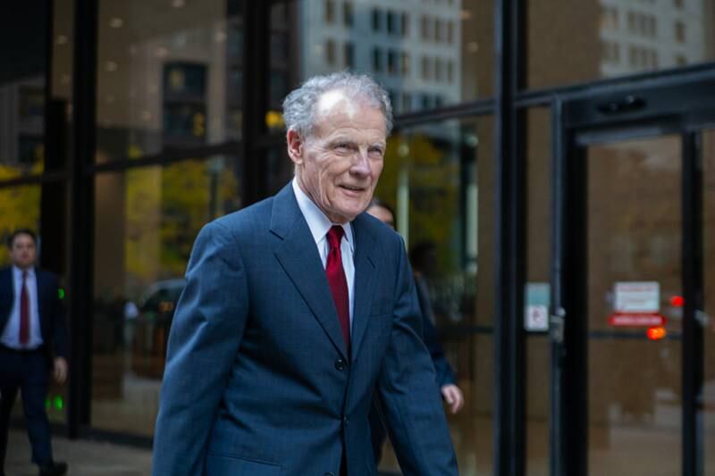 Former Illinois House Speaker Michael Madigan exits the Dirksen Federal Courthouse in Chicago on Oct. 21 after opening statements in his federal corruption trial.
