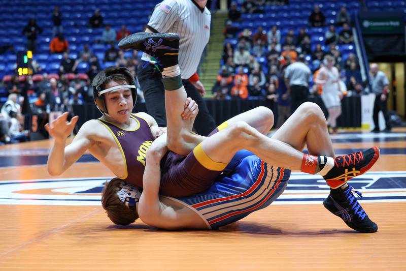 Montini's Erik Klichurov, top, wrestles Marmion Academy's James Morrison in the 113-pound match during Marmion Academy's victory over Montini in the IHSA Class 3A Dual Team State championship on Saturday, Feb. 28, 2026.