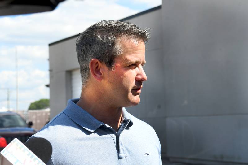 U.S. Rep. Adam Kinzinger (R-Channahon) speaks to the media outside Byron City Hall