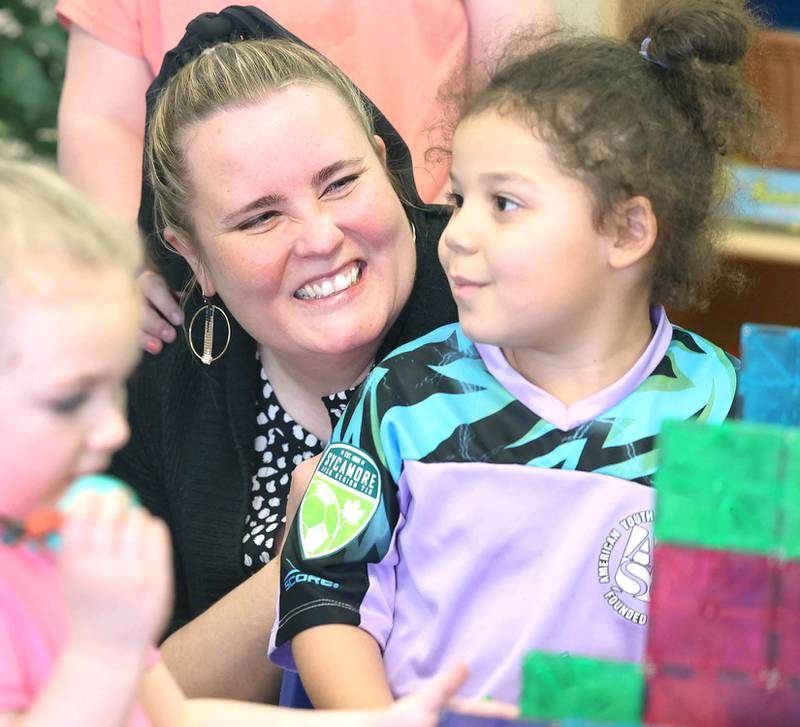 Laurel Copeland, Little Spartans Early Learning Program teacher at South Prairie Elementary School, has a laugh with Avery Anderson during class Wednesday, April 6, 2023, at the school in Sycamore.
