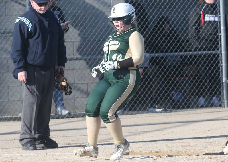 St. Bede's Macy Strauch scores a run against Woodland/Flanagan-Cornell on Tuesday, April 8, 2025 at Woodland High School.