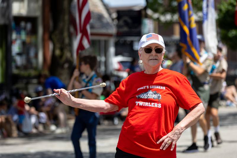 A Glen Ellyn Historical Society baton twirler performs during Glen Ellyn’s “4th of July Parade” on Friday, July 4, 2025.