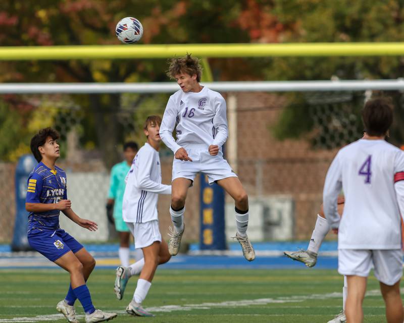 Downers Grove North's Oliver Davies (16) heads the ball during Class 3A Lyons Regional final soccer match.  Oct 21, 2023.