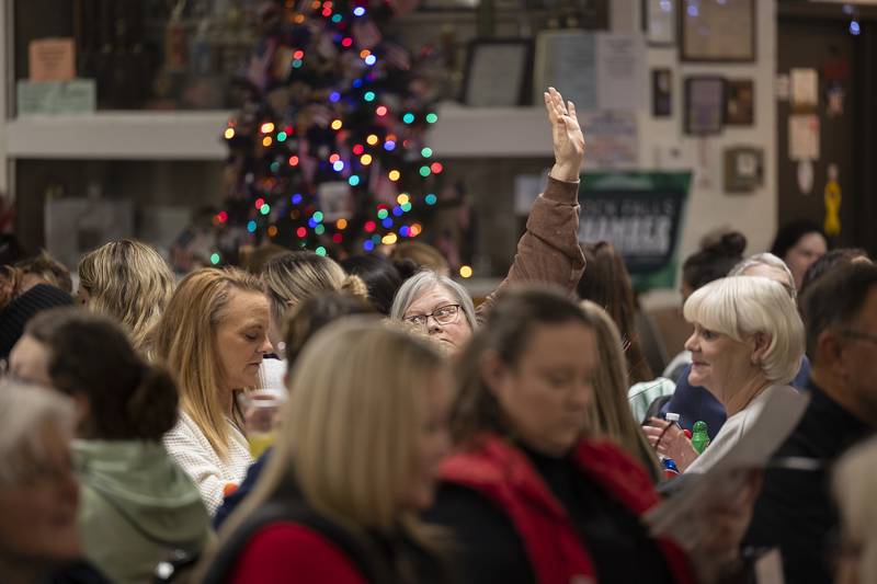 A BINGO winner calls for attention Thursday, Nov. 21, 2024, in Rock Falls. For prizes, local businesses supplied baskets and gift cards.