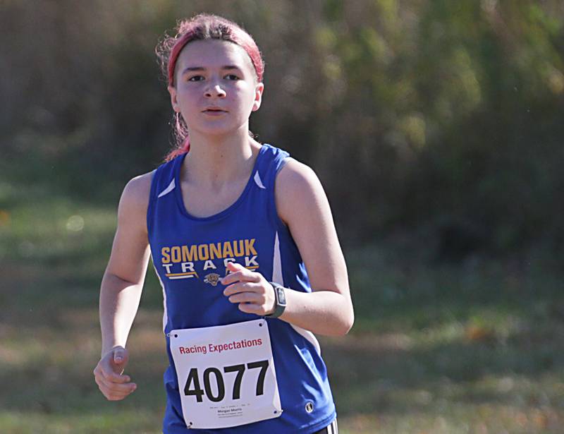Somonauk's Morgan Morris runs in the Class 1A Regional Cross Country gils race on Saturday, Oct. 22, 2022 at the Seneca FFA Farm in Marseilles.