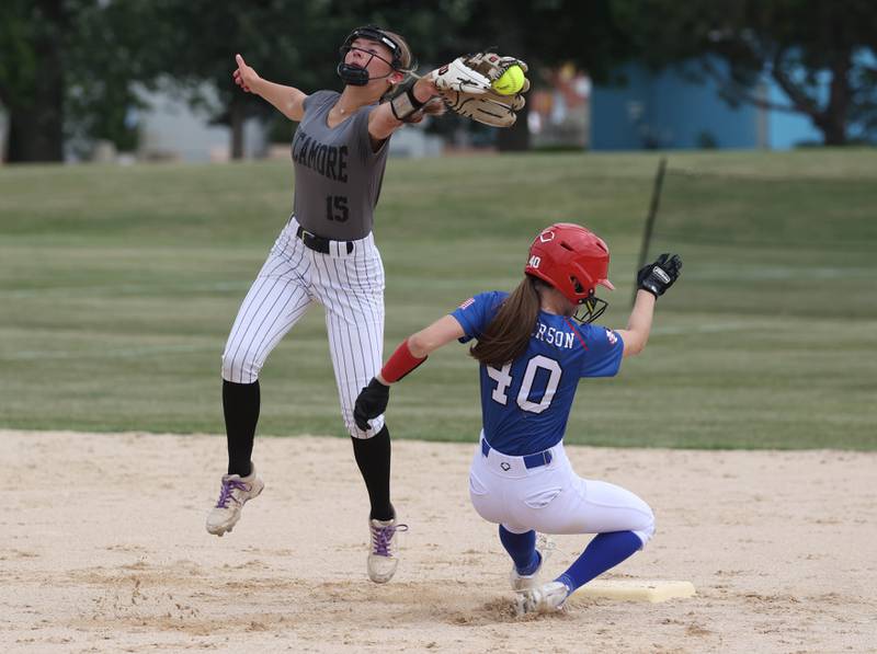Sycos’ Leah Harbecke reaches for the throw on a stolen base attempt Friday, June 27, 2025, during their 16u game against Select Fastpitch in the Storm Days tournament at the Sycamore Community Sports Complex.
