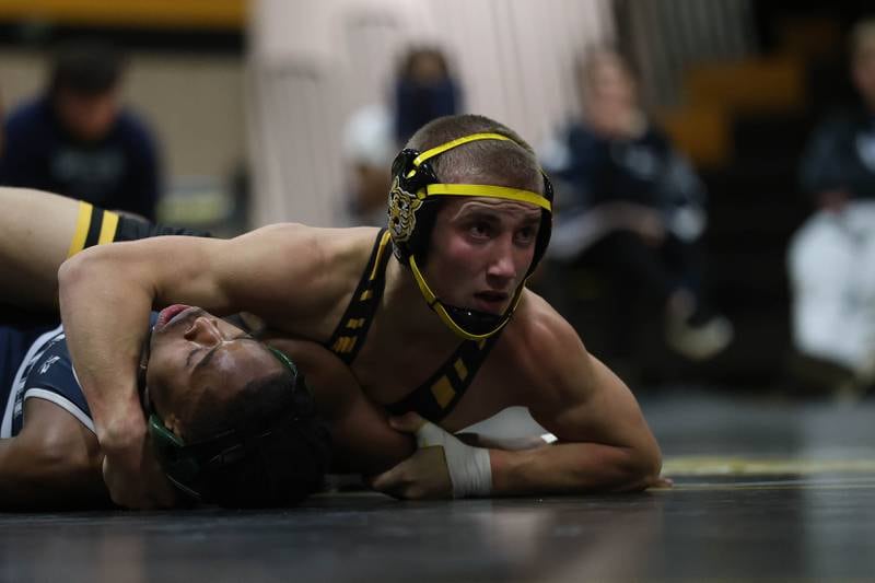 Joliet West’s Coehn Weber looks to the referee against Plainfield South’s Kayden Palmer in the 150 pound match on Wednesday, Dec. 3, 2025 in Joliet.