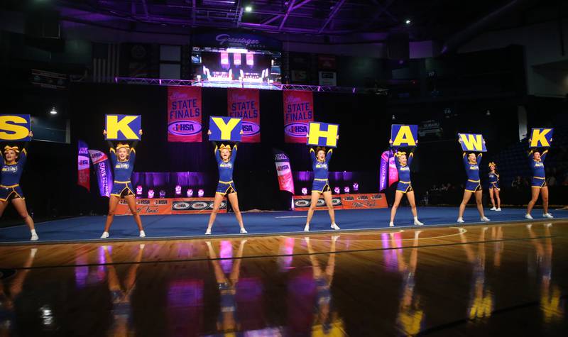 Members of the Johnsburg cheerleading team perform at the Competitive Cheerleading State Final Competition on Saturday, Feb. 3, 2024 at Grossinger Motors Arena in Bloomington.