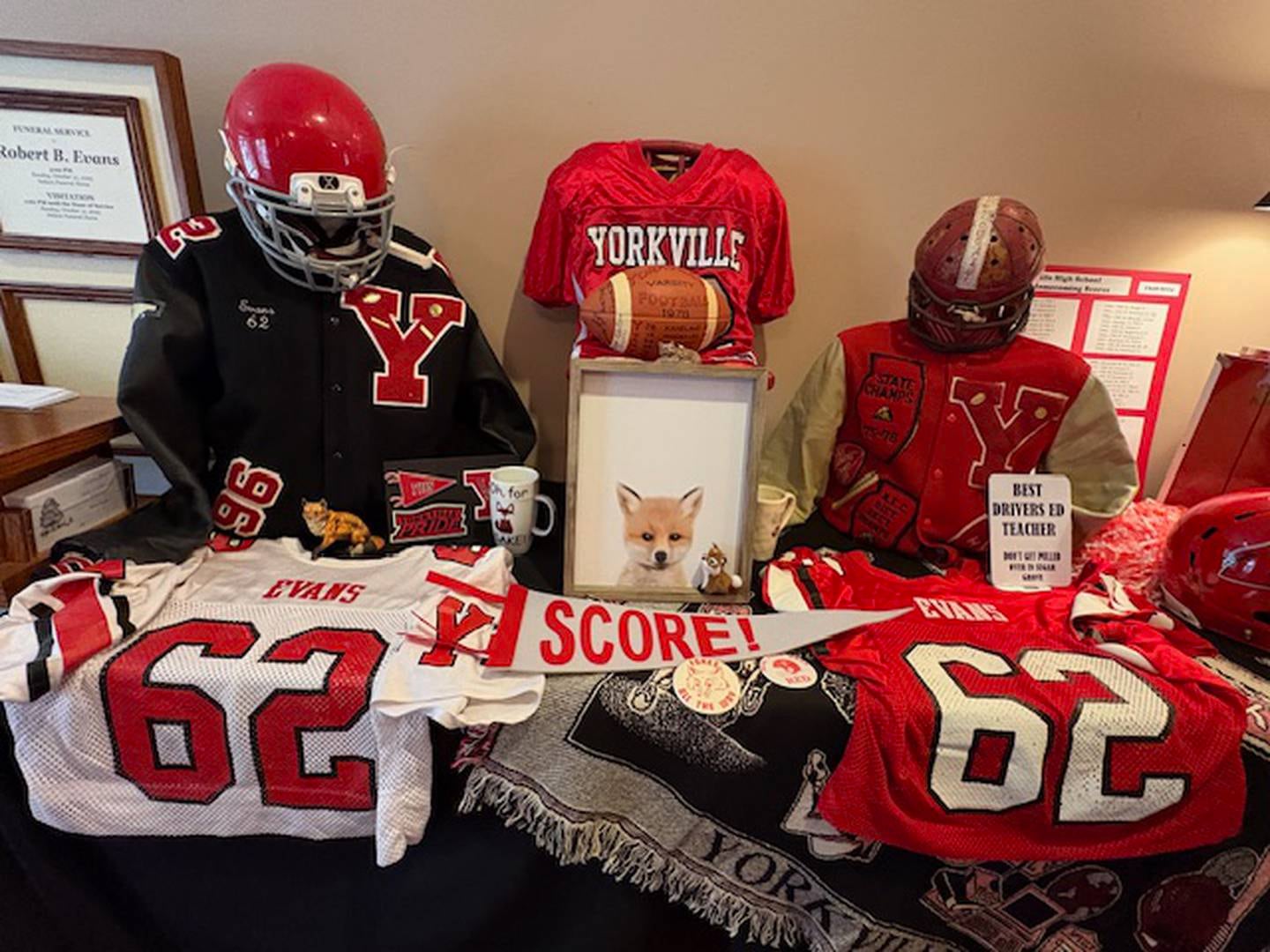A memorial table was created for former Yorkville High School football coach Robert Evans.