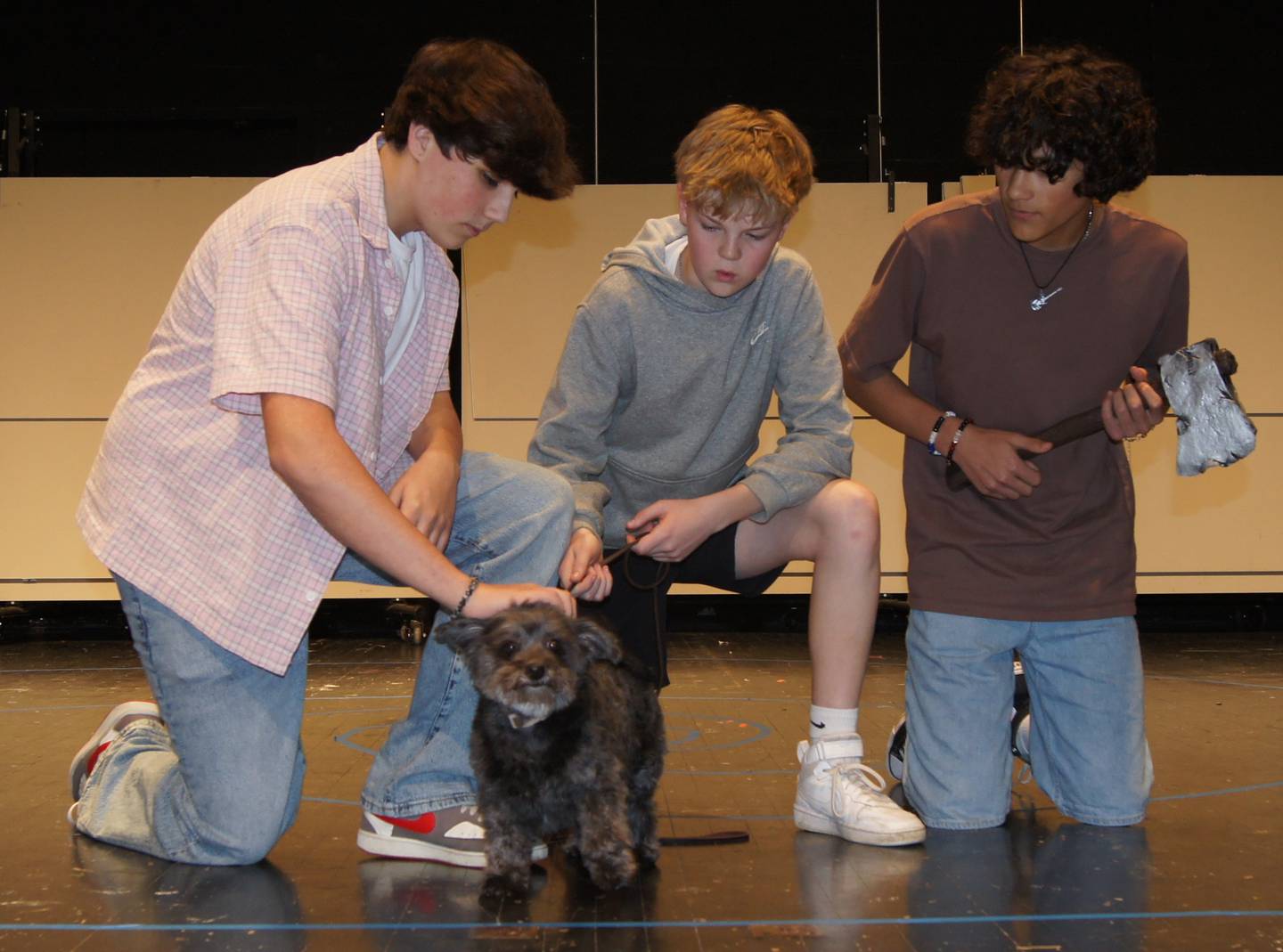 Sycamore Middle School cast members rehearsing a scene for their upcoming production of “The Wizard of Oz"