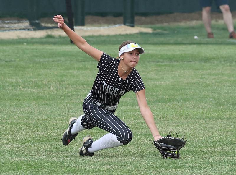 Crystal Lake Central's Brooklyn Johnson makes a diving catch for the third out to prevent Sycamore, who had runners on base, from scoring Tuesday, June 3, 2025 during their Class 3A sectional semifinal game at Sycamore High School.